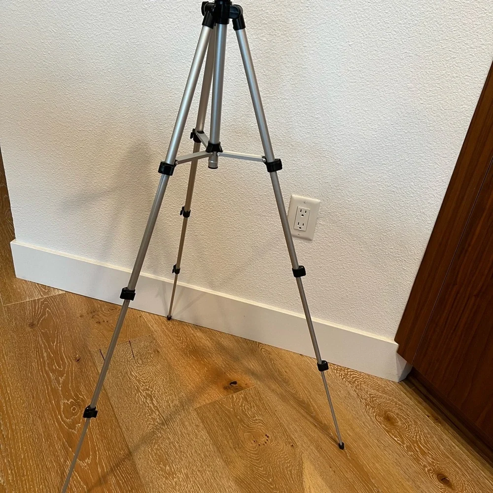 Compact Black and Silver Camera Tripod